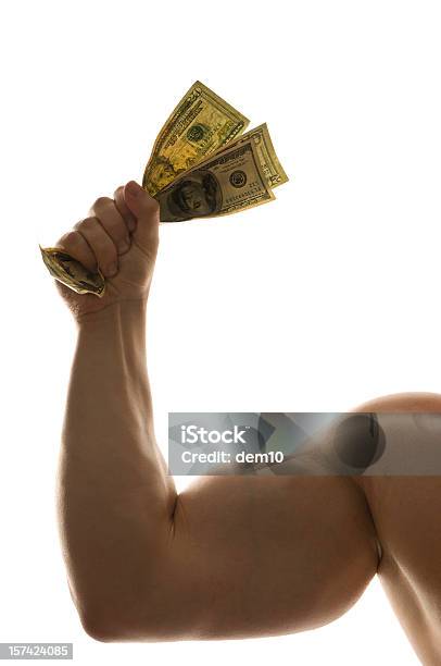 Photo libre de droit de Tenant Dollars banque d'images et plus d'images libres de droit de Contracter les muscles - Contracter les muscles, Monnaie, Finance