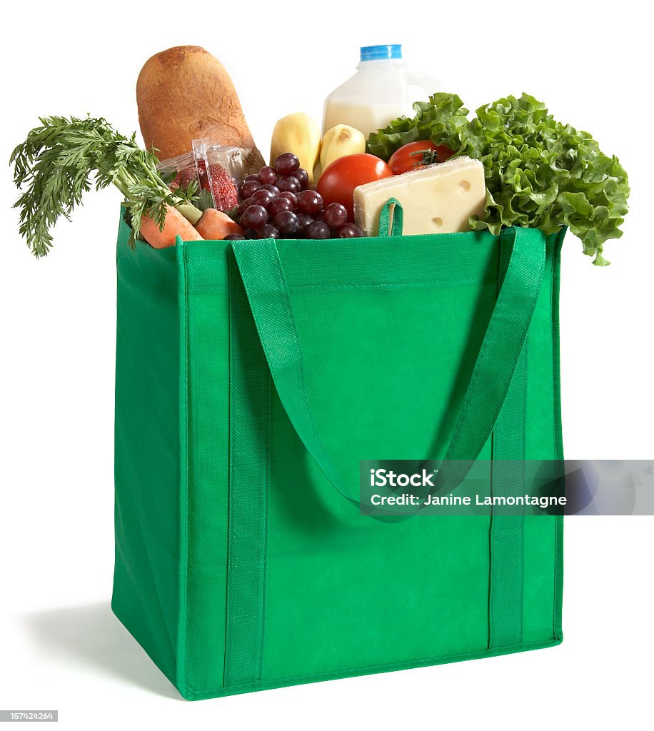 Close-up of reusable grocery bag filled with fresh produce A reusable/recyclable grocery bag filled with fresh groceries. Be Green! Supermarket Stock Photo