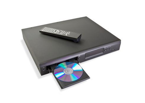 Blu-Ray/DVD player with remote. Isolated on white with clipping path and drop shadow included.
