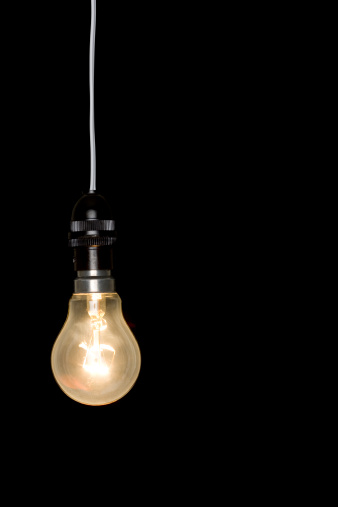 Retro Edison lamp. Black and white photography. Space for text. Copyspace.