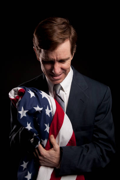 istock Businessman holding the American Flag 157424503