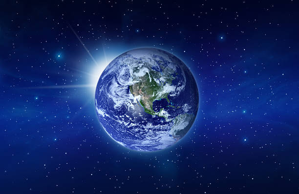 istock Planet Earth with Rising Sun behind 157424808