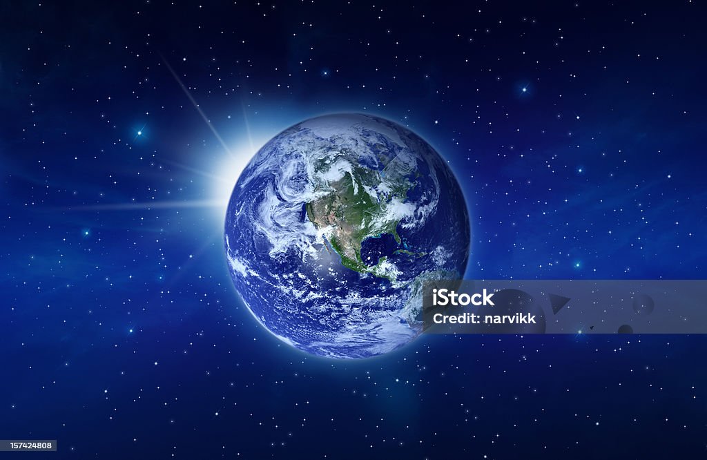 Planeta Terra com o sol por trás subida - Royalty-free As Américas Foto de stock