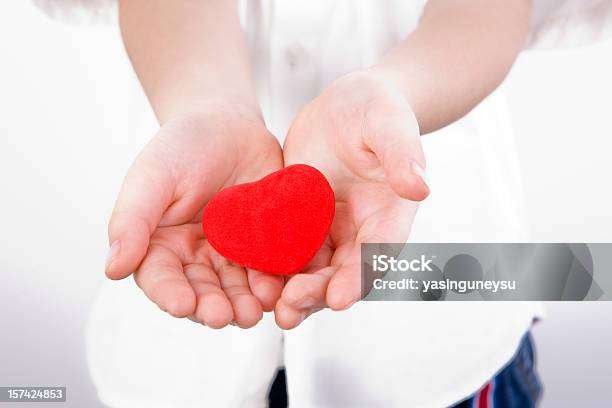 Childs Heart Charity Stock Photo - Download Image Now - 4-5 Years, 6-7 Years, Agreement