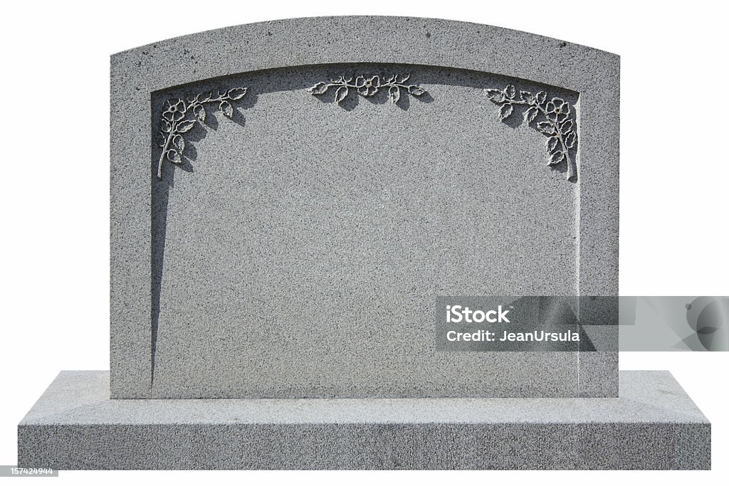 Tombstone isolated granite tombstone with flowers Tombstone Stock Photo