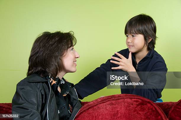 Boy Signing Mom In Asl Stock Photo - Download Image Now - American Sign Language, Child, Adult