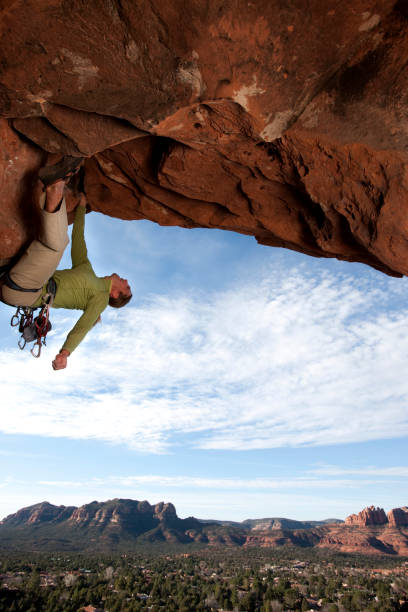 Active lifestyle. Sports in nature. Overcoming a difficult climbing route