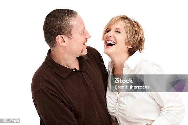 Foto de Feliz Rindo Casal e mais fotos de stock de 40-49 anos - 40-49 anos, Camisa Pólo, Mulheres