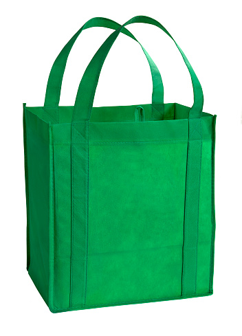 An empty and reusable green shopping bag. Eco-Friendly.