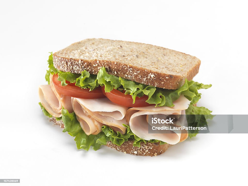 Sliced Smoked Turkey Sandwich Sliced Smoked Turkey Sandwich with Lettuce and Tomatoes - Photographed on a Hasselblad H3D11-39 megapixel Camera System Sandwich Stock Photo