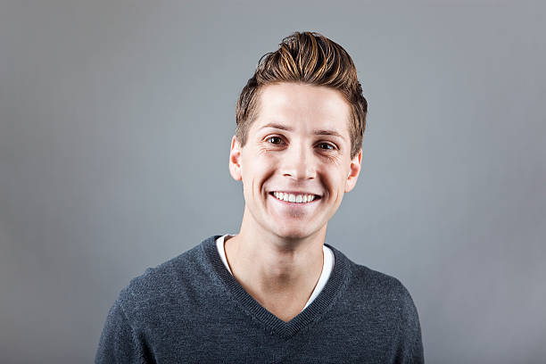 istock Portrait of a happy young man 157428345
