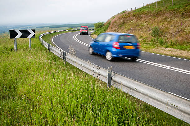 istock Cars Passing on a Corner 157428440