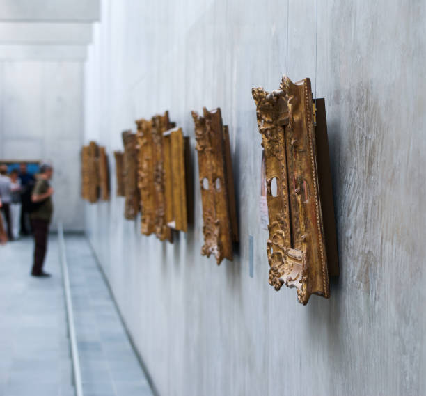 Art gallery Art gallery in Paris, with visitor out of focus. hanging art on wall stock pictures, royalty-free photos & images
