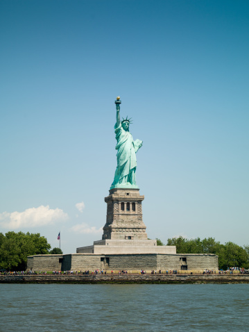 Statue of Liberty in New York on Liberty Island against Blue Summer Sky, USA. Hasselblad H3D-II 50 MegaPixel.