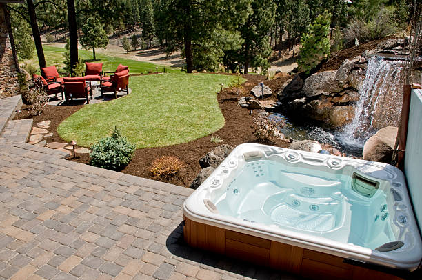 Hot tub with backyard  hot tub stock pictures, royalty-free photos & images
