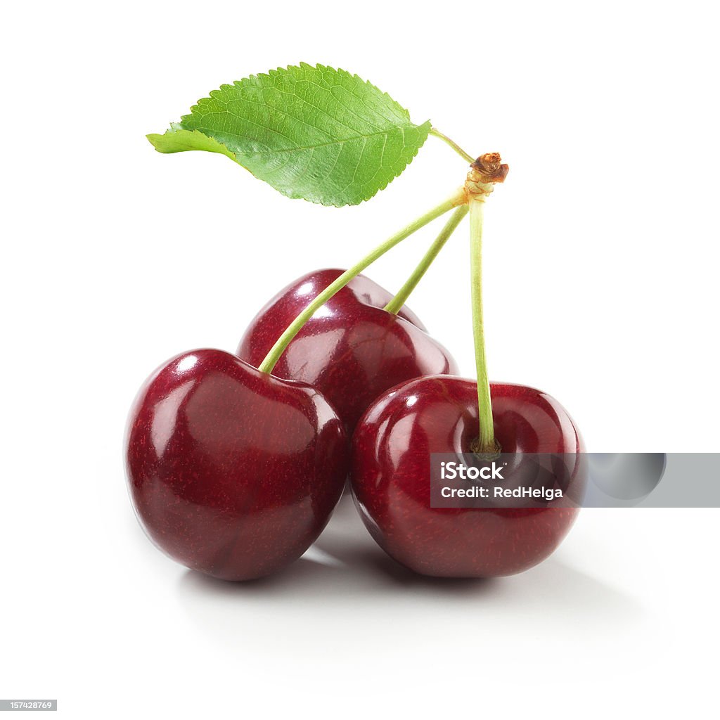 Cherry trio with stem and Leaf The file includes a excellent clipping path, so it's easy to work with these professionally retouched high quality image. Need some more Fruits & Berrys? Cherry Stock Photo