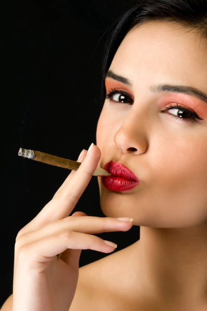 istock cigar and sexy lips 157428823