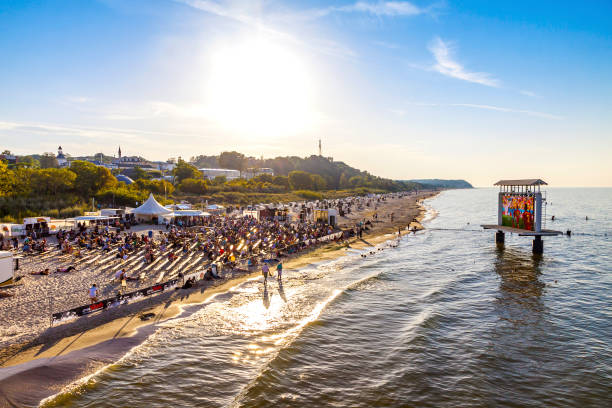 Heringsdorf, Germany - July 5, 2014: People watch the FIFA World Cup 2014 football game Argentina v Belgium at the Open Air Cinema on the beach in Heringsdorf, Ruegen, Insel Usedom