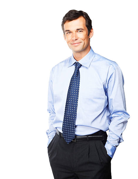istock Mature businessman smiling with his hands in pockets 157429101