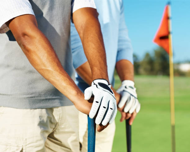 istock Mid section view of two male golfers 157429115
