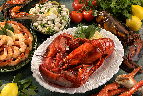 Assortment of  Shellfish Seafood  lobster seafood stock pictures, royalty-free photos & images