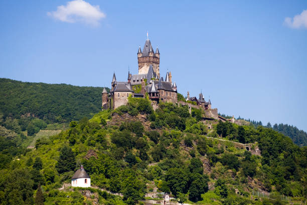 Medieval castle in Germany standing in the bright sunlight of a clear autumn day
