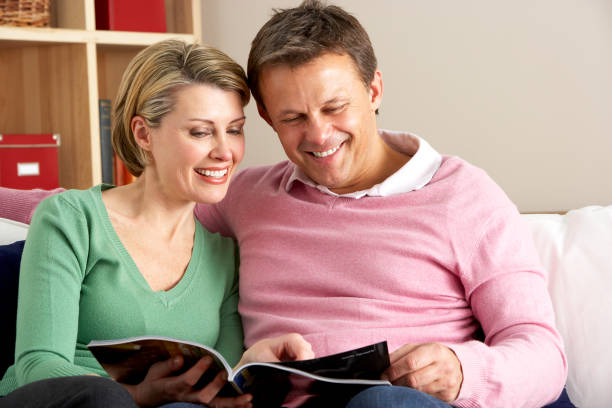 istock Middle Aged Couple Relaxing At Home 157429323