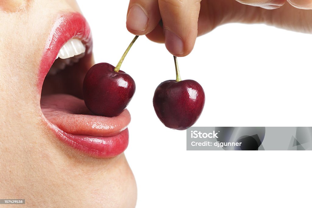 Chica comiendo cerezas - Foto de stock de Sensualidad libre de derechos