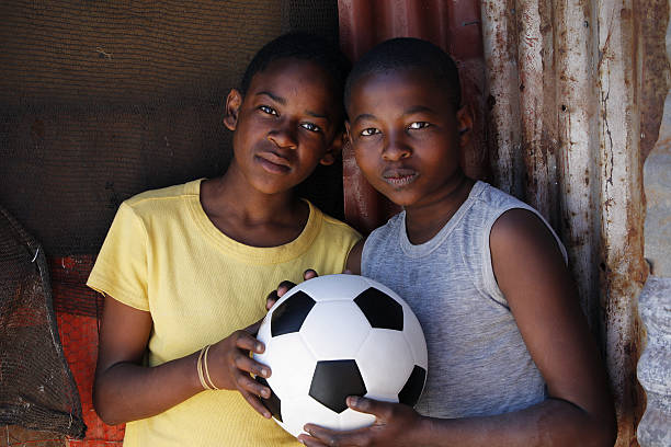 istock African children ith soccer ball 157429772