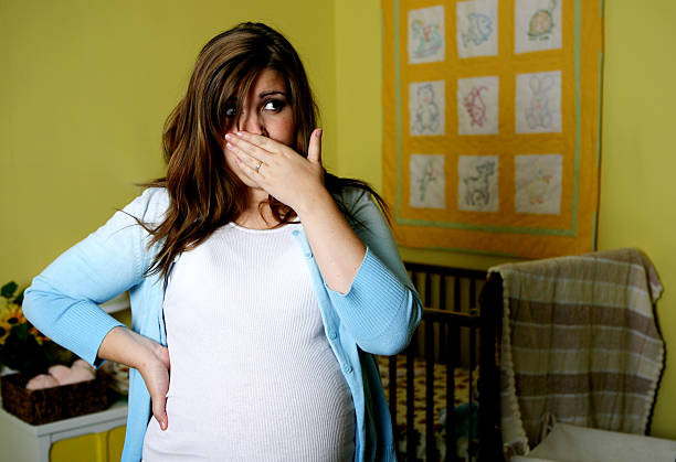 Pregnancy and nausea stock photo