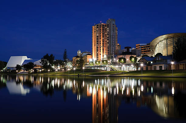 Central Adelaide at Night Central Adelaide across the river Torrens.  The city's Convention Centre is visible to the right of the picture, and the Festival Centre to the left hand side. adelaide stock pictures, royalty-free photos & images