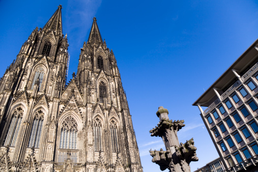 Cologne, Germany - Jun 6th 2023: Cologne cathedral is iconic and internationally known landmark in German city. It's twin towers are visible all over the city.