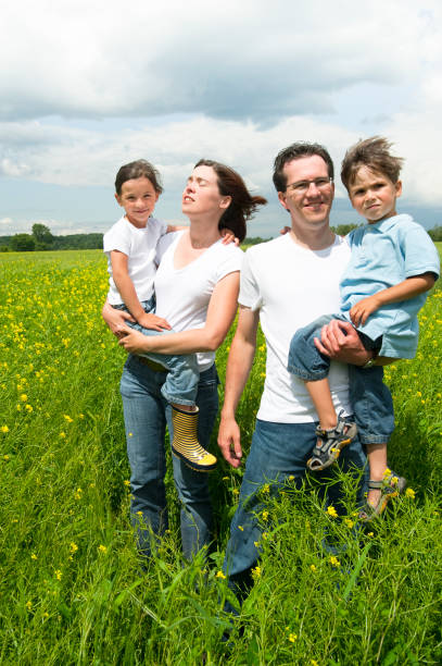 istock Family portrait in a mustard field. 157430028