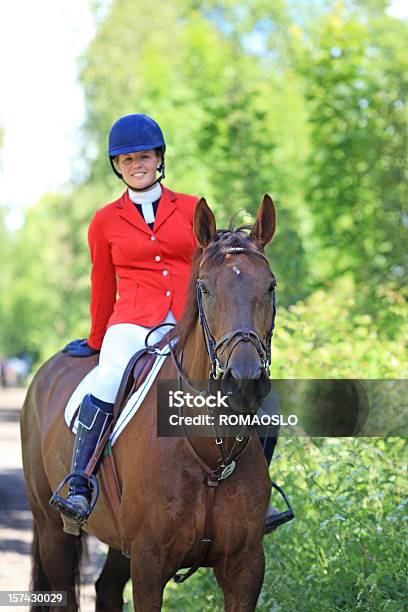 Happy Teenager Horseback Riding And Dressed For Competition Stock Photo - Download Image Now