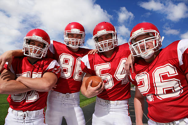 istock Smiling Football Players 157430083