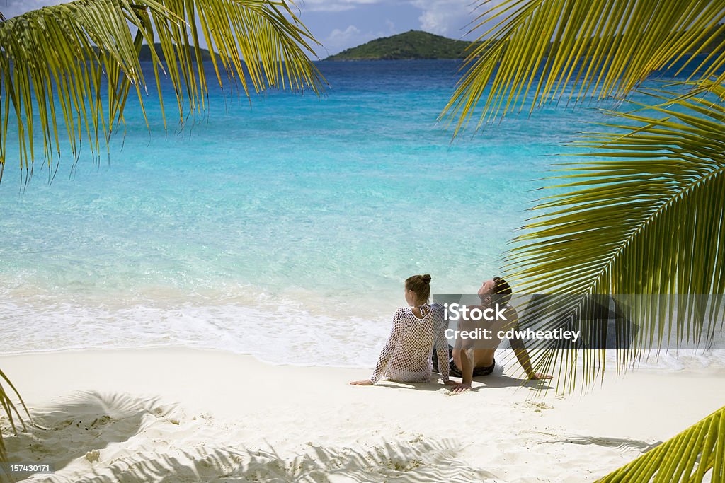 couple relaxing on the beach couple relaxing on the Caribbean beach Beach Stock Photo