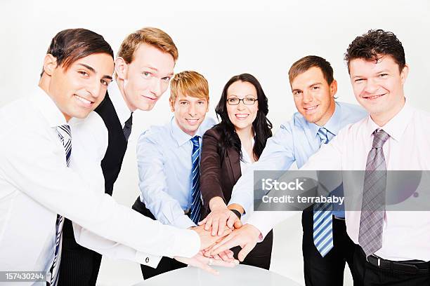Business Team Spirit Hands Together Stock Photo - Download Image Now - Achievement, Adult, Arms Outstretched