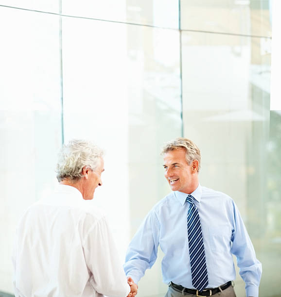 istock Business colleagues shaking hands 157430272
