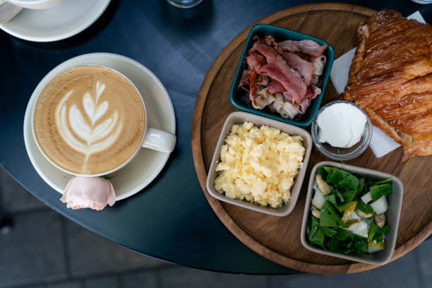 istock Top view of breakfast with coffee and croissant 1574302747