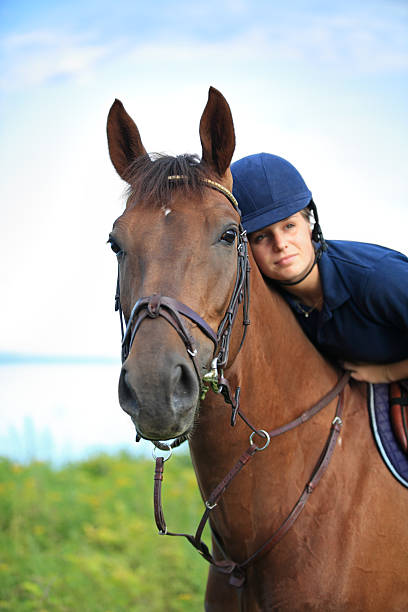 istock Girl hugging her horse 157430482