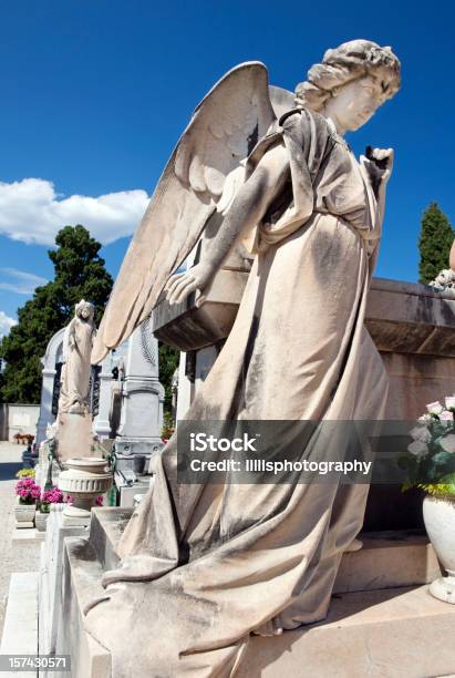 Stone Angel On Grave In Provence Stock Photo - Download Image Now - Afterlife, Angel, Animal Body Part