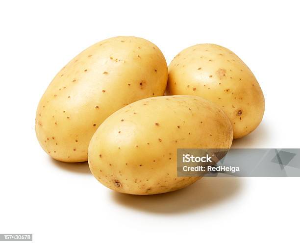 Three Potatoes Stock Photo - Download Image Now - Raw Potato, Cut Out, White Background