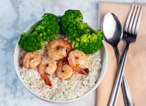 istock white rice top with shrimp and broccoli, 1574307092
