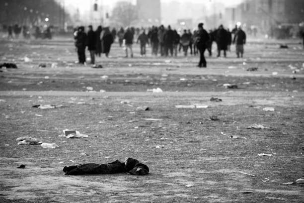 Riot aftermath crowds of people, Washington DC Riot Aftermath.  Black and white image, Washington DC Mall.  Vignetting added for effect.  Crowds linger after an event - riot, protest, election, event.  Washington DC.  Check out my  peace demonstration stock pictures, royalty-free photos & images