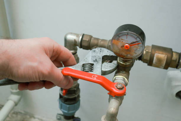 istock Replace Damaged manometer. Plumping servise. Bad pressure gauge in the pipeline. Metallic pressure sensor. 1574317512