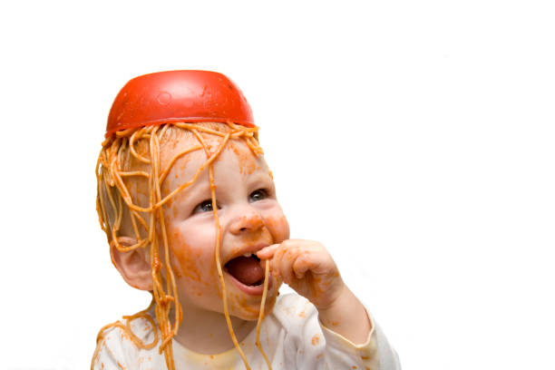 Messy Spaghetti Baby stock photo