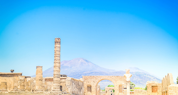 ruins of Pompeii with Vesuveus volcano in background, Italy
