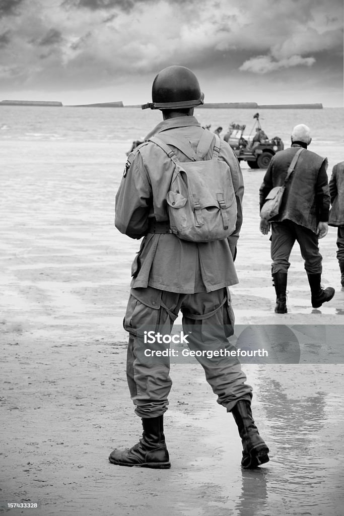 Soldier on beach at D-Day  D Day Stock Photo