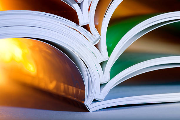 istock Close-up of opened magazines 157433437