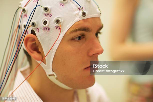 Man Connected With Cables To Computer Eeg For Resarch Stock Photo - Download Image Now